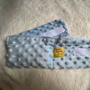 Herbal warming pouch to soothe babies stomach pain.